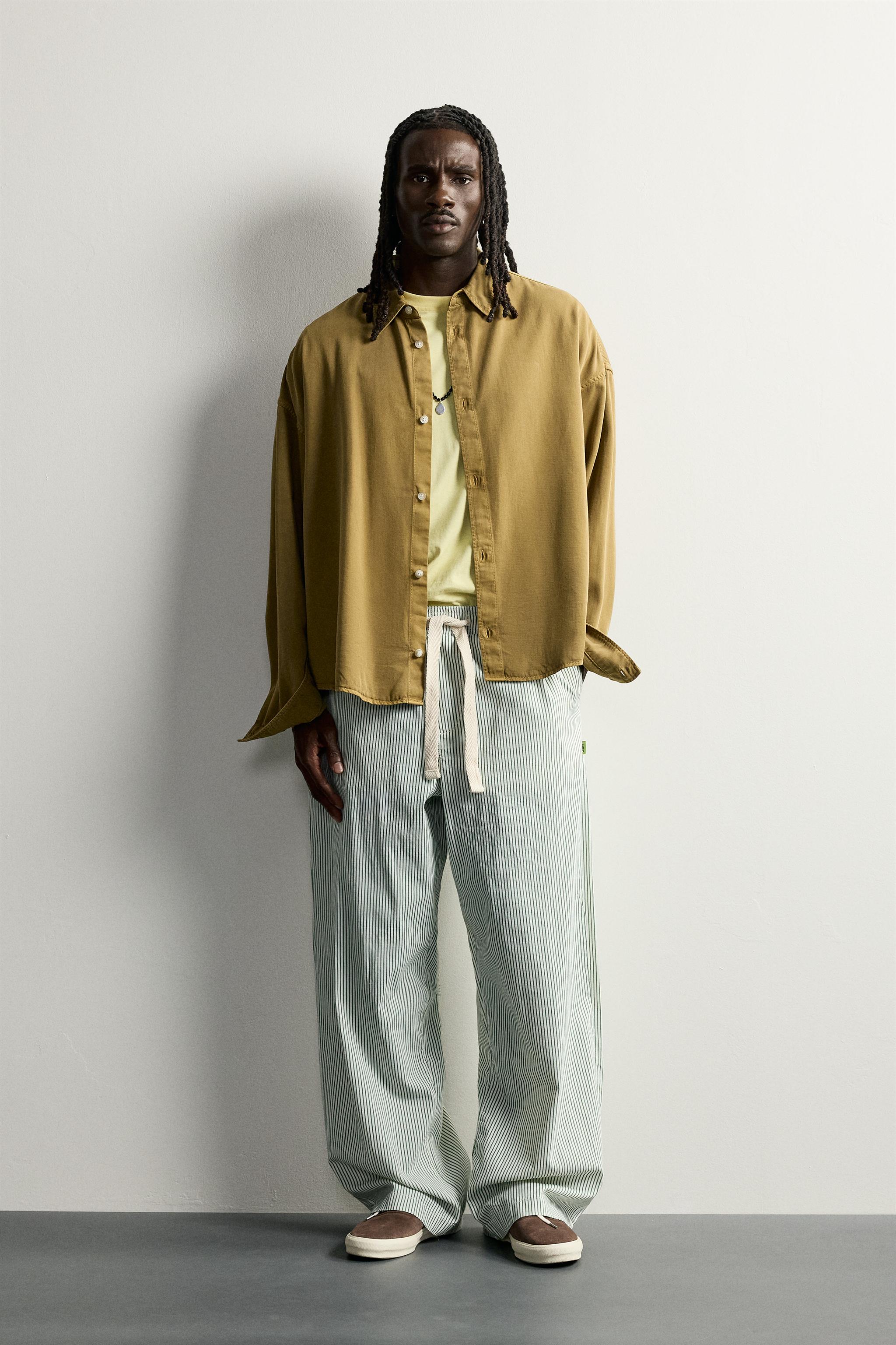 STRIPED BAGGY FIT PANTS